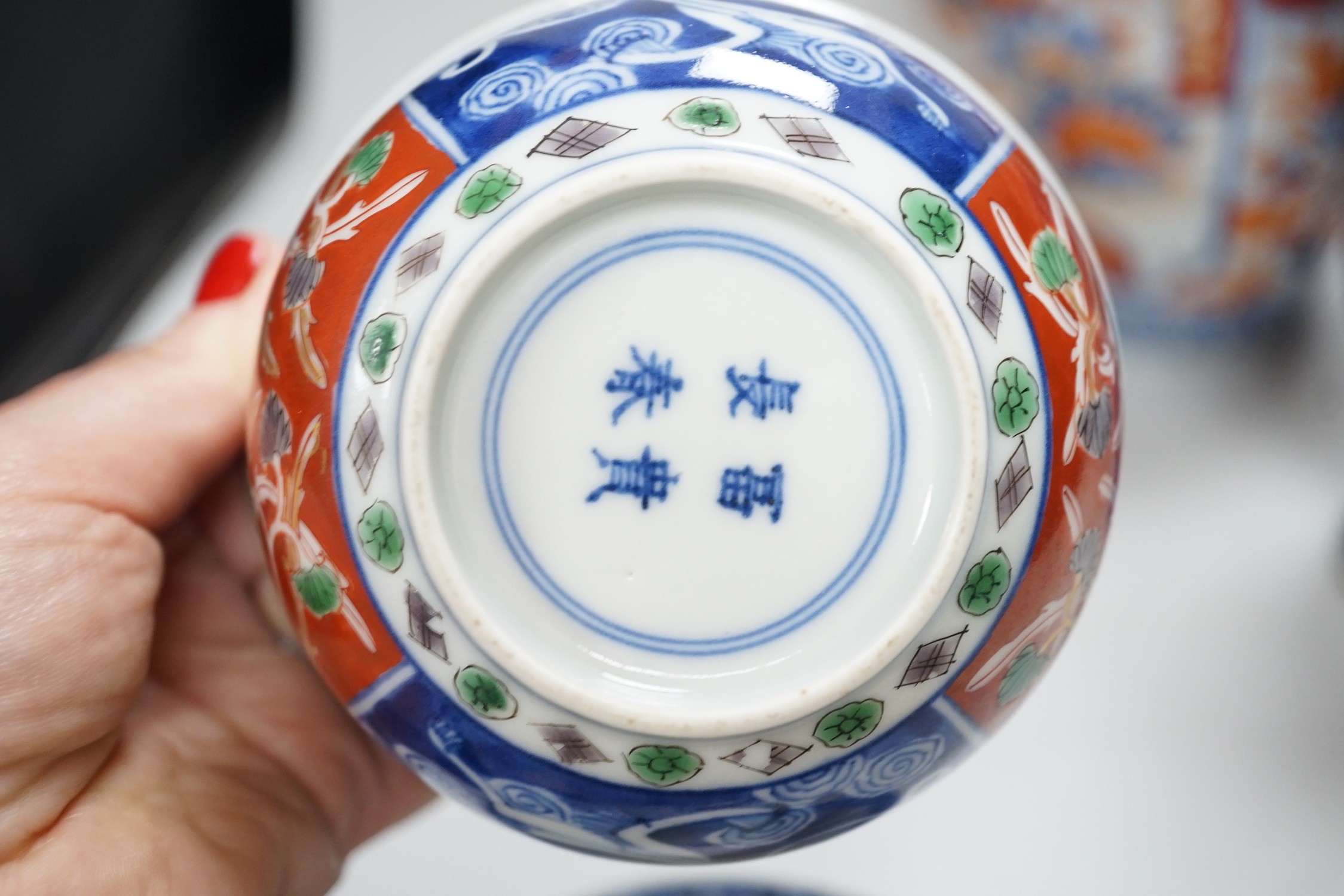 A Chinese prunus vase, 20cm, two Imari vases and a pair of Chinese bowls